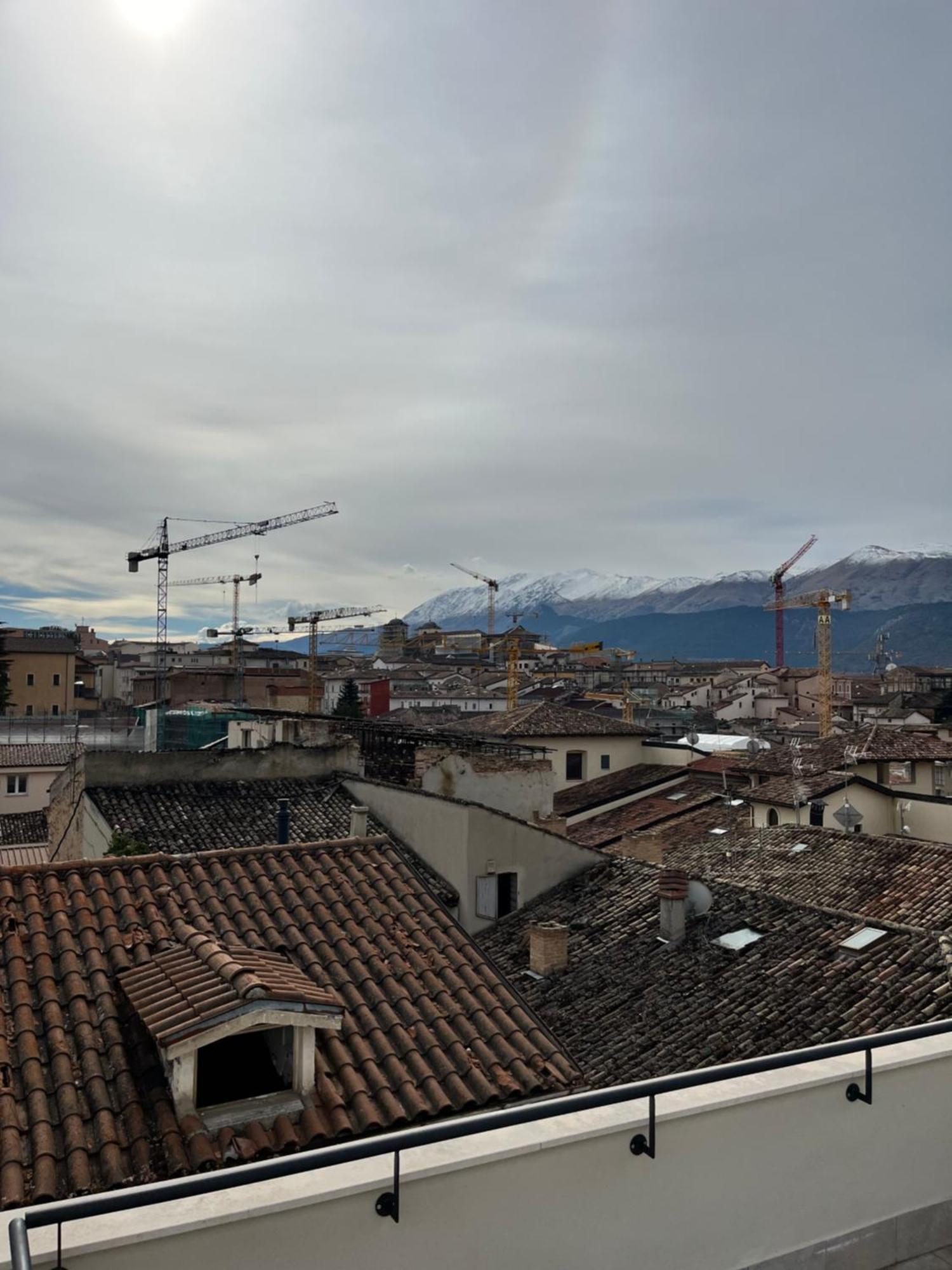 Habita Appartamenti Л'Акуила Экстерьер фото